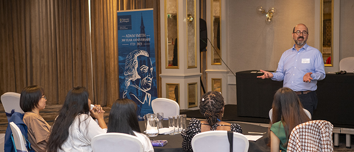 Dr Javier Yanez-Arenas standing presenting to a group of students