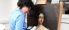 Researcher at work analysing an oil painting in the Kelvin Centre technical art history laboratory