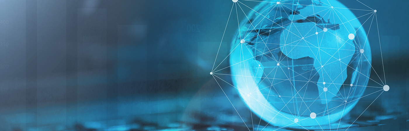 A blue globe on a keyboard to as an international business concept