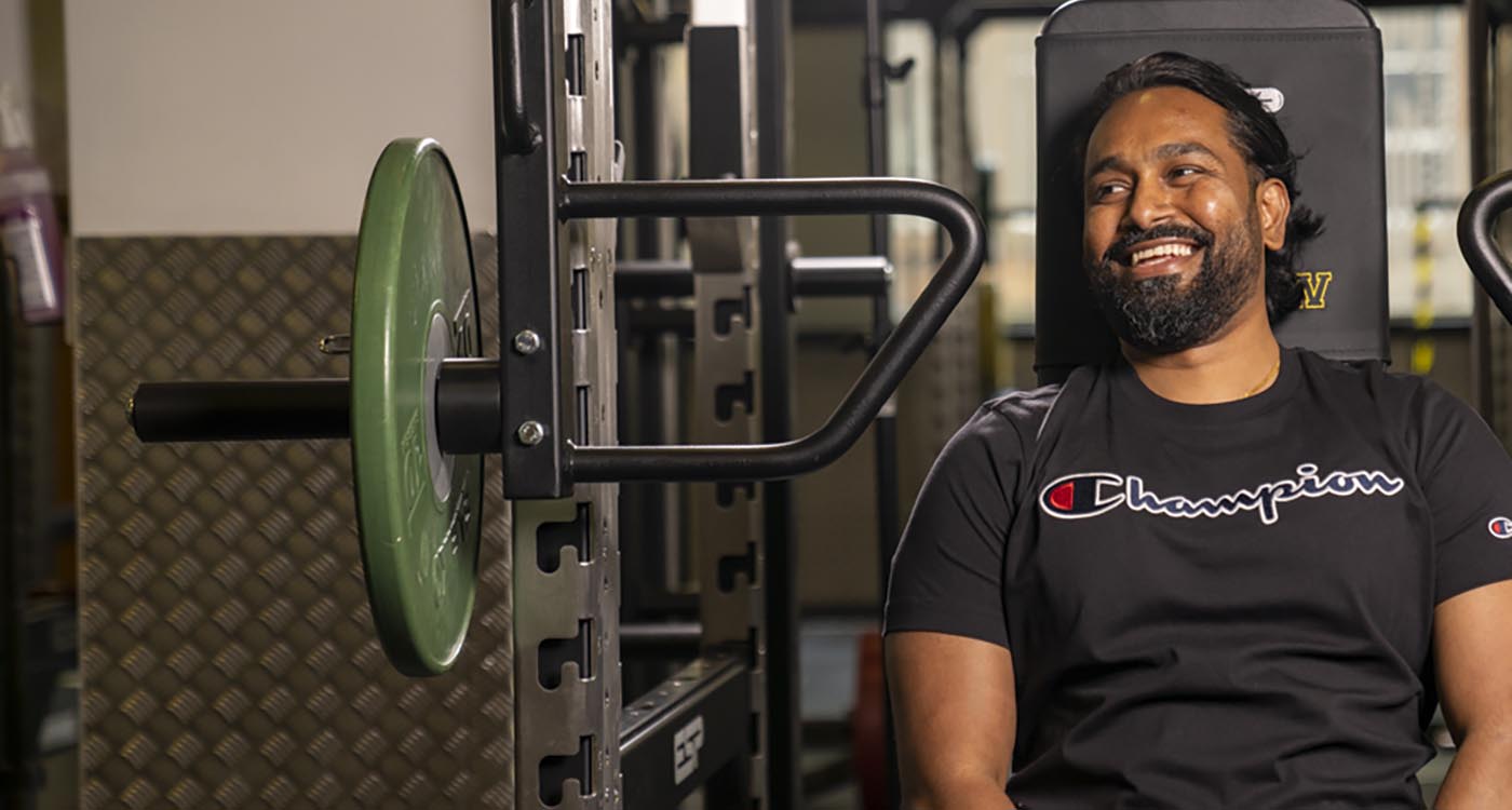 UofG Sport member smiling in gym