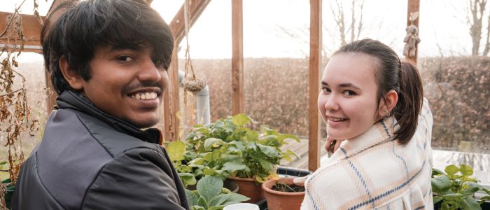 Two students gardening at Dumfries campus