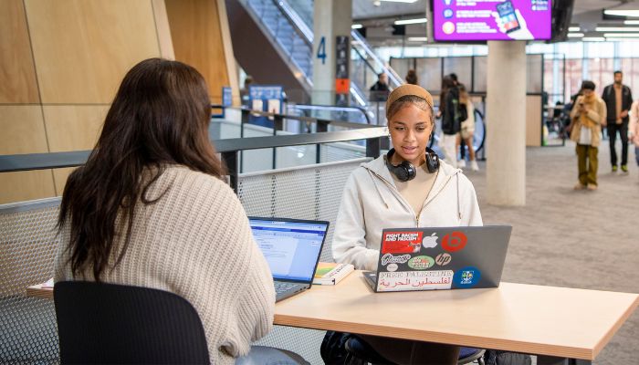 Two students studying in the James McCune Smith Building