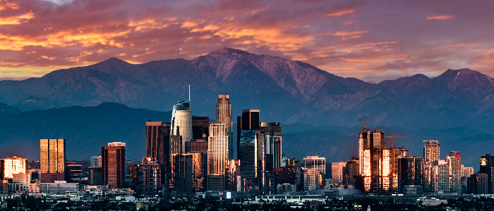 City skyline with red sunset