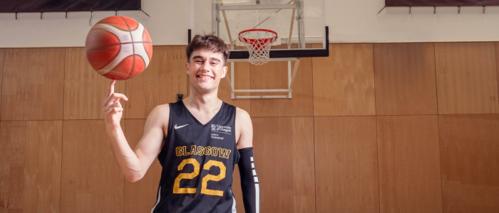 UofG Sport basketball player smiling to camera