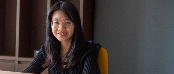 Student smiling at the camera