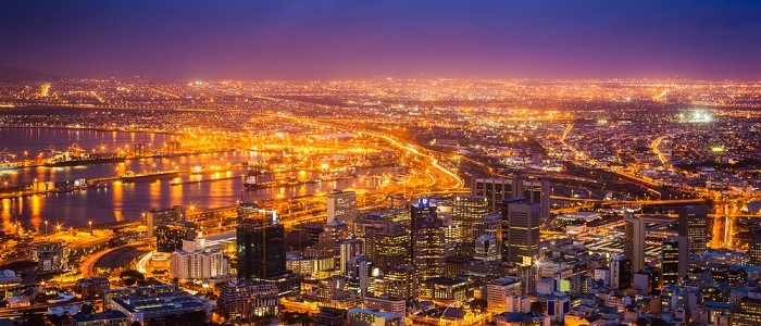 Landscape of city in South Africa at night time - showing lots of lights