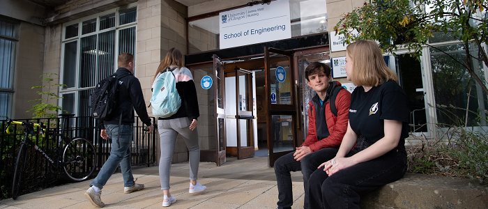 Students outside the doors of the Engineering building