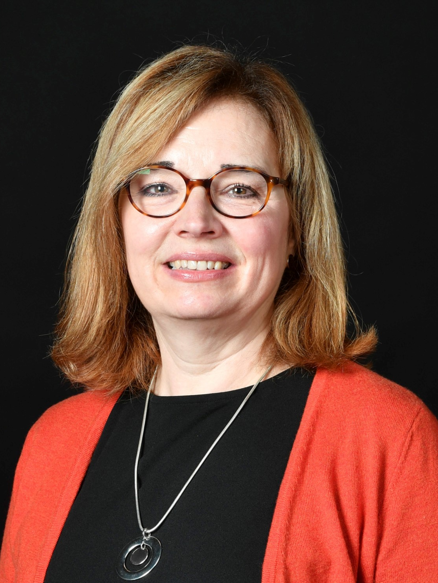 Headshot of Nicole Busby