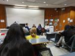 Domestic abuse survivors talking about their experiences at IWD event