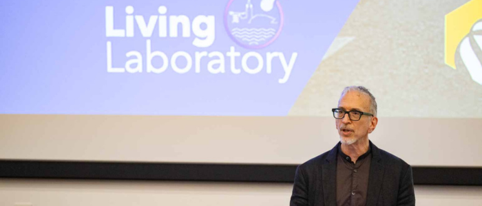 Professor Ross Cagan Presenting at a Symposium