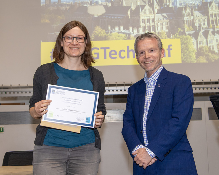 staff receiving award 2nd prize
