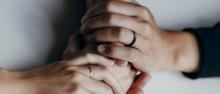 Stock image of hands holding