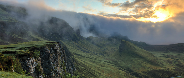 Landscape with cliff, grass and sky