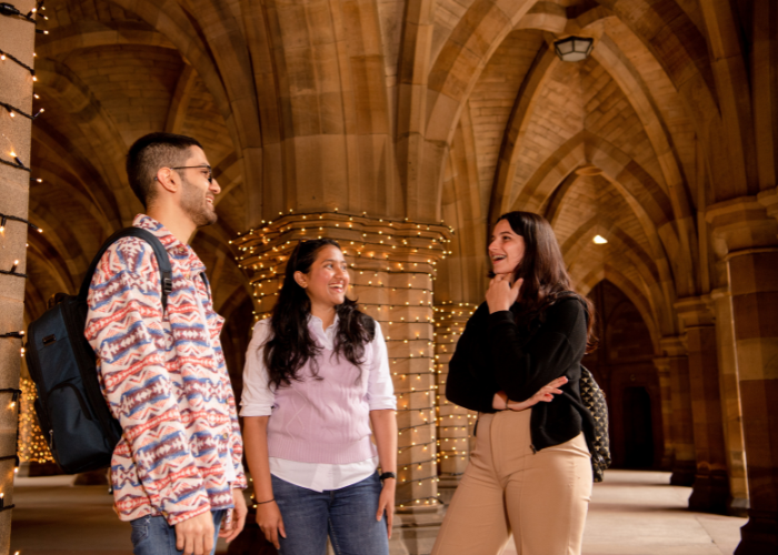 Students talking in the cloisters