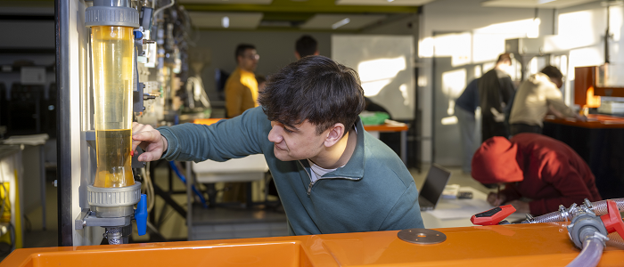 Engineering student undertaking practical work