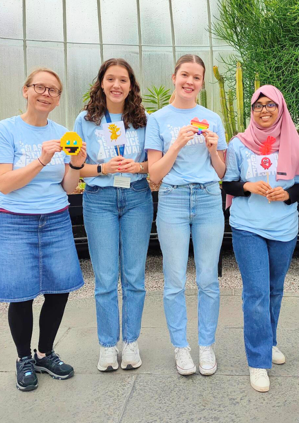 A group of Living Lab staff members posing with Lego