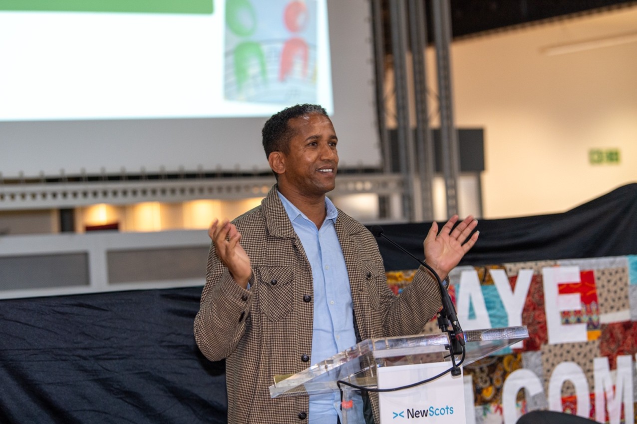 Speaker talking to audience