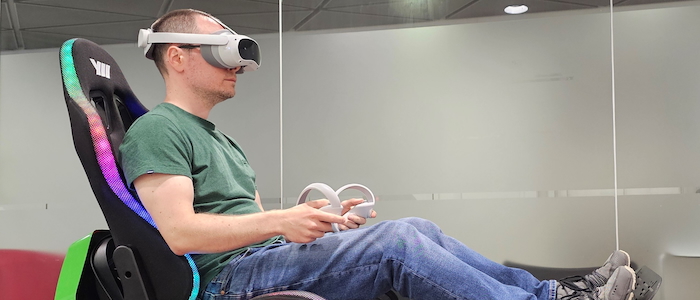 A photo showing a study participant sitting in a motorised chair