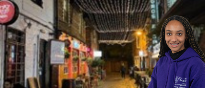 Ashton Lane at night with smiling woman headshot