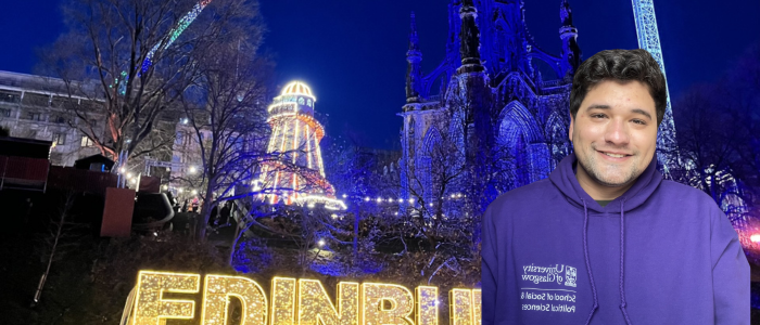 Christmas lights in Edinburgh at night with headshot of smiling man