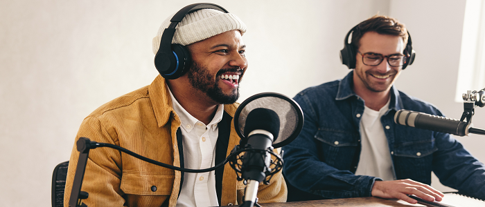 Young men in a studio looking happy