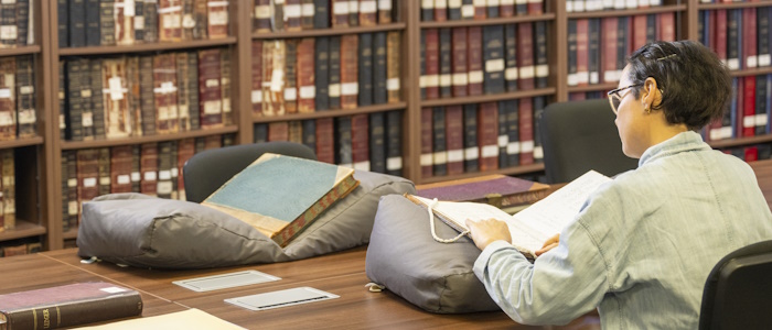 A reader consulting an item in our Thurso Street reading room