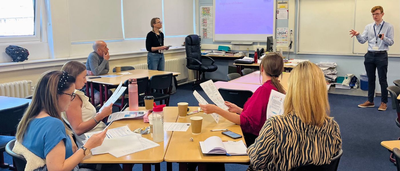 A group of teachers in a classroom