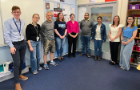 A group photo of teachers in a classroom