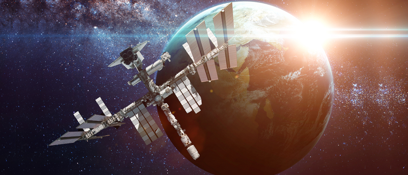 A realistic illustrative image of a sattelite oribiting the earth in space