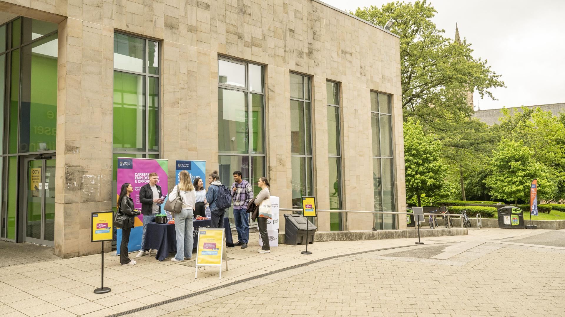 Employers speaking to students at a pop-up outside the Fraser Building