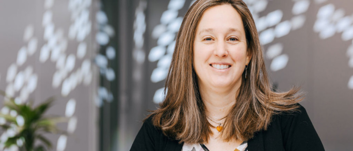 Photograph of Professor Jaime Toney smiling at the camera