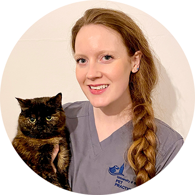 Head shot of Dr Juliet Stirling holding a cat