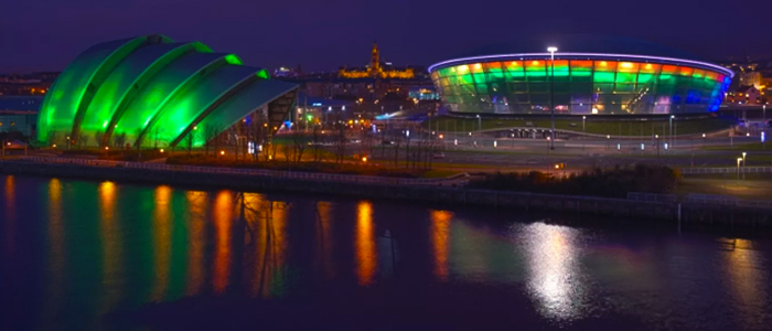 The river Clyde waterfront with the Hydro and Armadillo venues at the forefront and Glasgow University buildings in the background