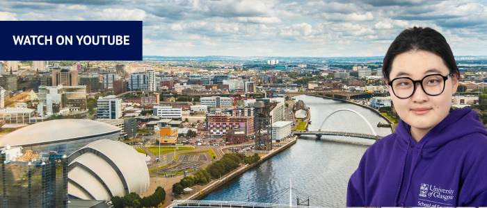 View down the river Clyde and the city of Glasgow with headshot of smiling woman