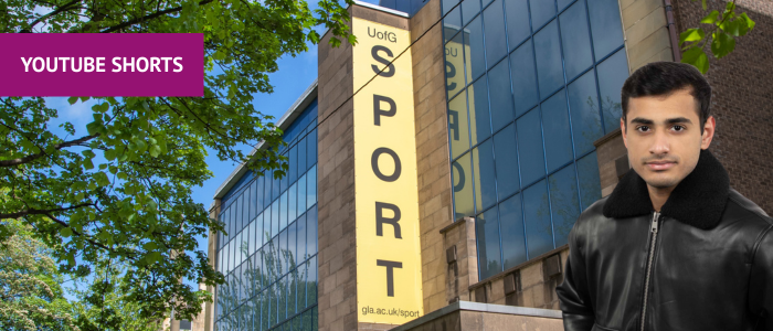 Exterior of the Stevenson building with the UofG Sport sign and headshot of man