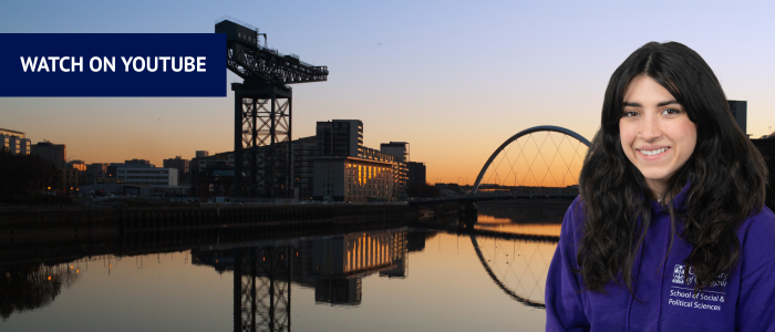 View of the Clyde Arc and Finnieston Crane over the River Clyde at sunset with headshot of smiling woman
