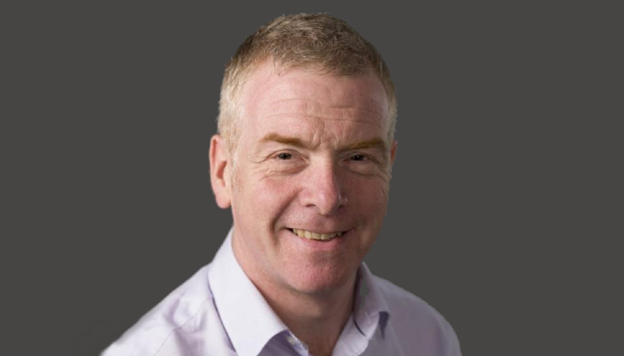 A head and shoulders portrait shot of Professor Simon Milling