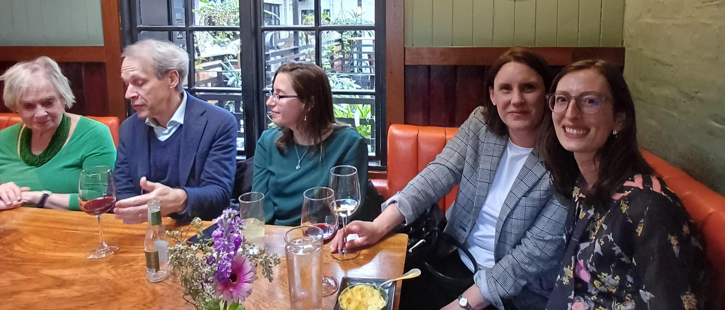 Staff and students from the Comp Lit department celebrate the programme's 20th anniversary at a restaurant