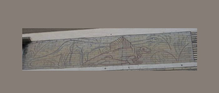 Frieze on wall of Chemistry building depicting origin of the species