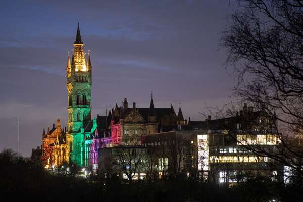 The Gilbert Scott Building lit-up for Pride
