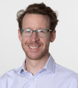 A head and shoulders portrait shot of Dr Gareth-Rhys Jones