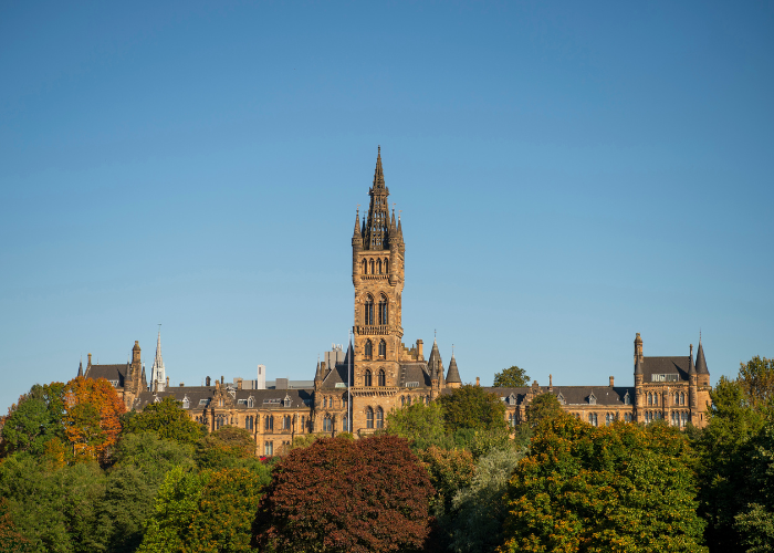 View of the Gilbert Scott Building on the hill with Kelvingrove Park below
