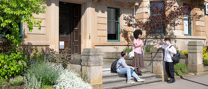 Students chatting in University Gardens