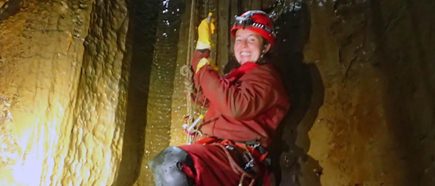 Student in a cave