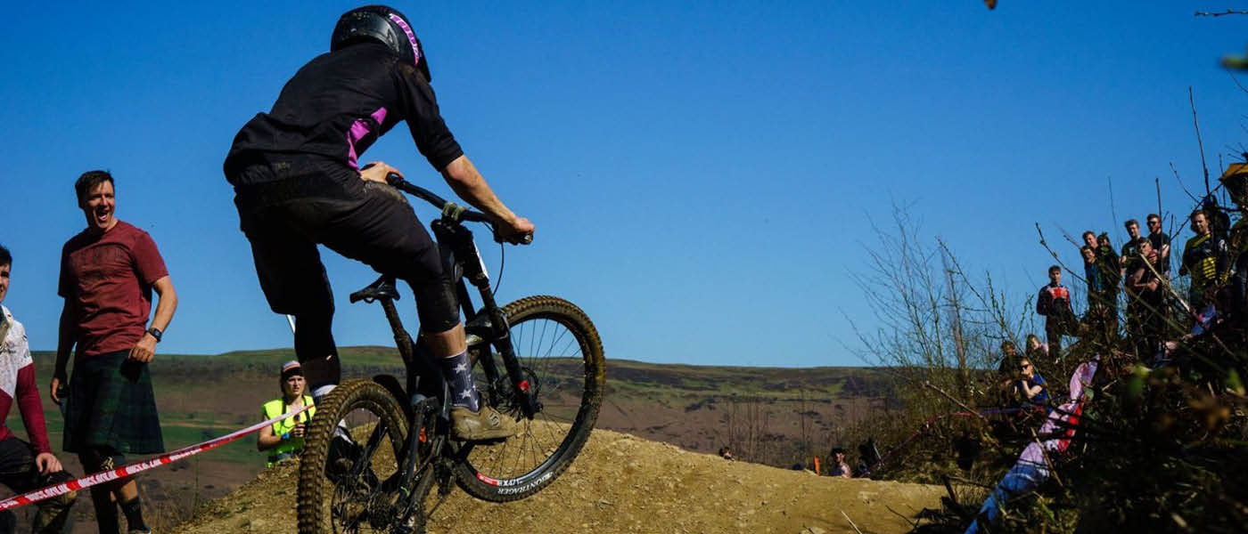 Mountain biker taking on a jump