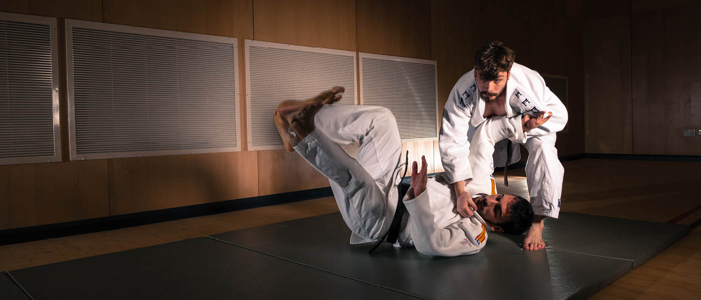 Two students practicing judo skills