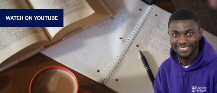 Tag in the left-hand corner saying 'Watch on YouTube' against an image of open notebooks and laptops with headshot of a man in a purple hoodie in the righthand corner.