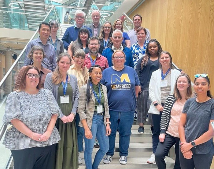 Group photo of delegates from UCEAP posing in a group with staff from the University of Glasgow