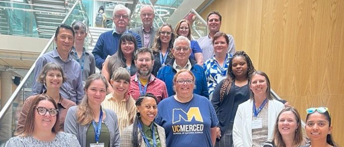 Group photo of delegates from UCEAP posing in a group with staff from the University of Glasgow