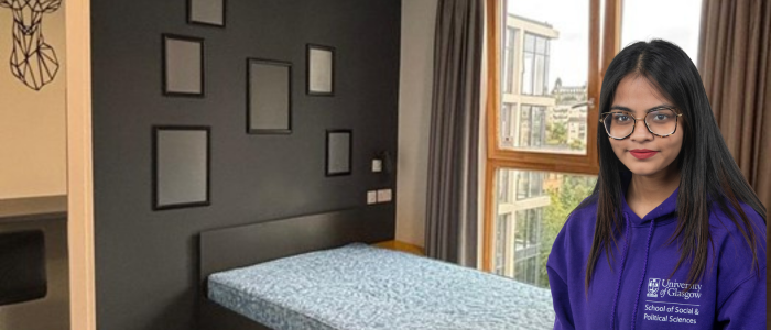 View of internal student accommodation room with headshot of woman in jumper on the right side